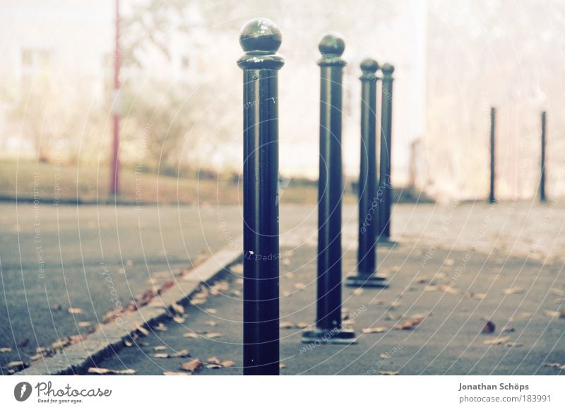 in a row across the street Colour photo Exterior shot Deserted Copy Space left Dawn Light Shallow depth of field Small Town Old town Blue Brown Disciplined