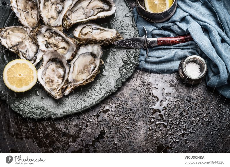 Open oysters on vintage plate with lemon and knife Seafood Nutrition Dinner Buffet Brunch Banquet Crockery Plate Knives Luxury Style Design Healthy Eating Life