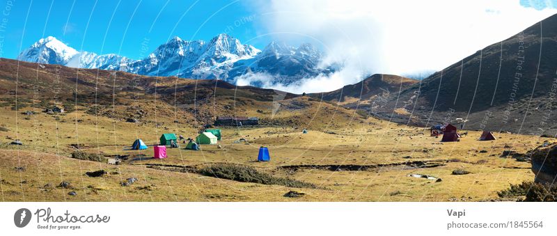 Campsite with tents on the top of high mountains. Panorama Vacation & Travel Tourism Expedition Camping Sun Snow Mountain Hiking Environment Nature Landscape