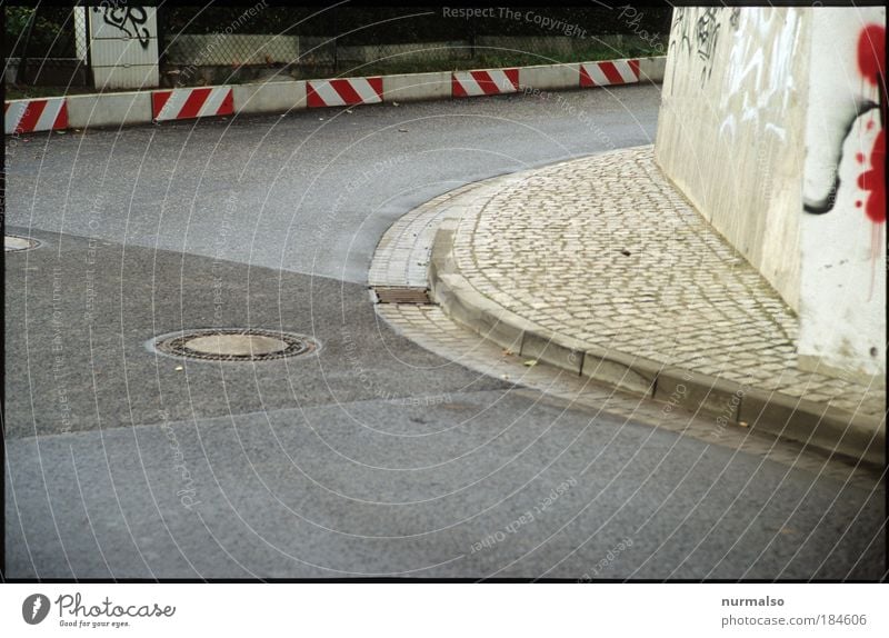 car turning right Colour photo Deserted Day Technology Art Work of art Youth culture Environment Town Bridge Wall (barrier) Wall (building) Transport Street