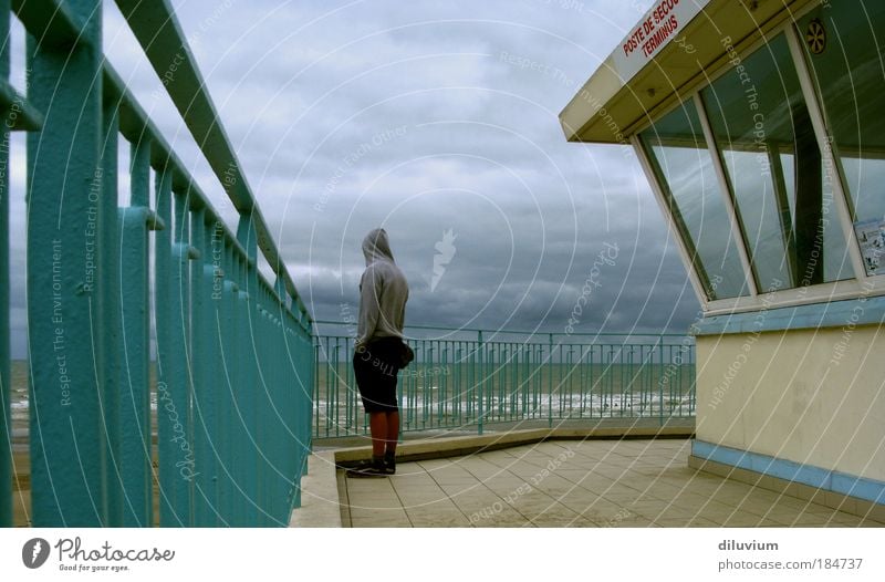 Hard on the wind Colour photo Exterior shot Morning Rear view Masculine Back 1 Human being Clouds Waves Coast North Sea Looking Stand Blue Gray Loneliness