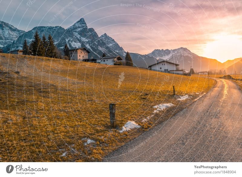 Country road toward alpine village Meditation Vacation & Travel Tourism Winter Snow Winter vacation Mountain Nature Landscape Alps Peak Snowcapped peak Village