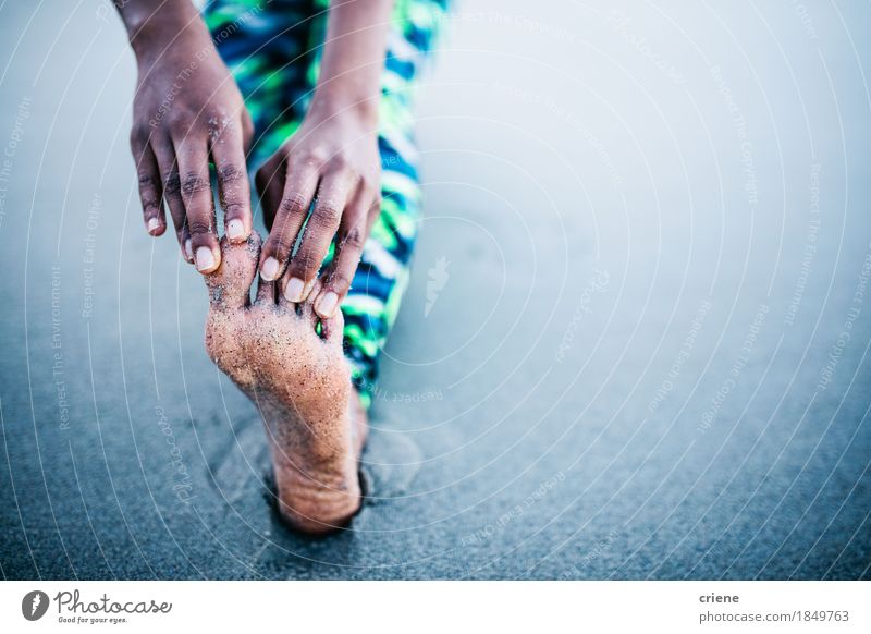 Close-up of Women stretching legs and Toes at beach Lifestyle Personal hygiene Body Athletic Fitness Wellness Meditation Leisure and hobbies Beach Yoga Woman