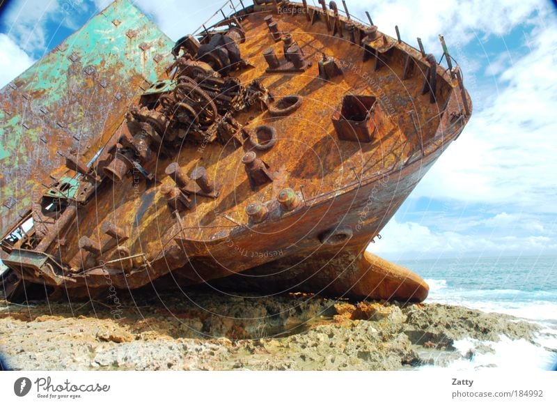 End of the trip Water Clouds Weather Rock Waves Coast Ocean Gulf of Mexico Navigation Wreck Stone Metal Old Gigantic Broken Brown Fear of death Respect Crisis