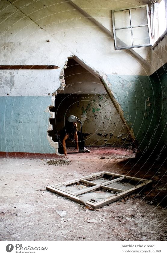 summer Human being Masculine Industrial plant Factory Ruin Building Wall (barrier) Wall (building) Window Door Long-haired Dreadlocks Crouch Threat Dark Creepy