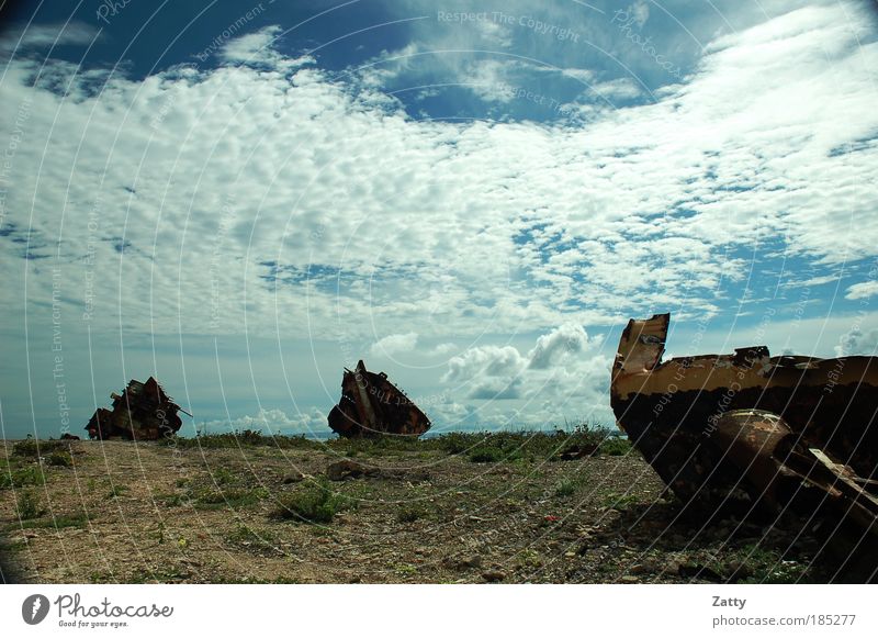 ship graveyard Clouds Rock Coast Navigation Wreck Stone Metal Rust Dirty Creepy Broken Chaos Destruction Colour photo Exterior shot Deserted Copy Space top Day