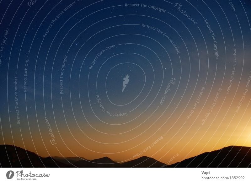 Sunset over mountain peaks and blue dark night sky Vacation & Travel Mountain Hiking Environment Nature Landscape Sky Cloudless sky Night sky Stars Horizon