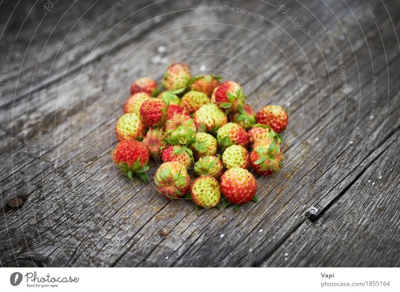 Bunch of red wild strawberry Food Fruit Dessert Nutrition Breakfast Organic produce Vegetarian diet Diet Healthy Eating Summer Nature Leaf Wood Old Fresh