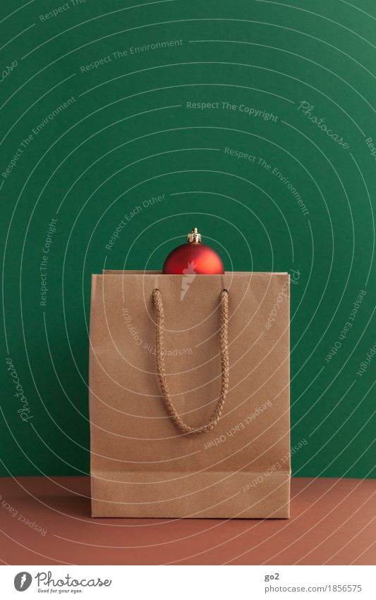 gift Shopping Christmas & Advent Paper bag Bag Gift Brown Green Red Trade Glitter Ball Colour photo Interior shot Studio shot Close-up Deserted Copy Space left