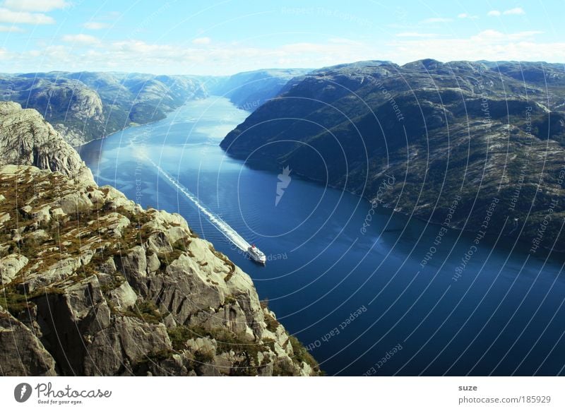 Happy birthday, Photocase! Fjord Lysefjord Ocean Norway Scandinavia Calm Mountain Loneliness Blue Coast Slope Rock Gravel Water Free Freedom Clouds Sky Nature