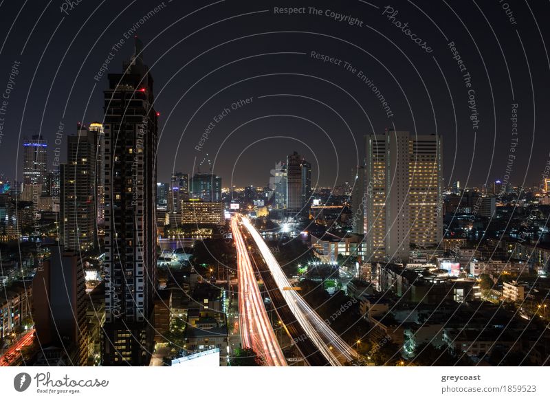 Night cityscape of Bangkok, Thailand capital. View to the illuminated buildings and busy motorway River High-rise Bridge Building Architecture Transport Street