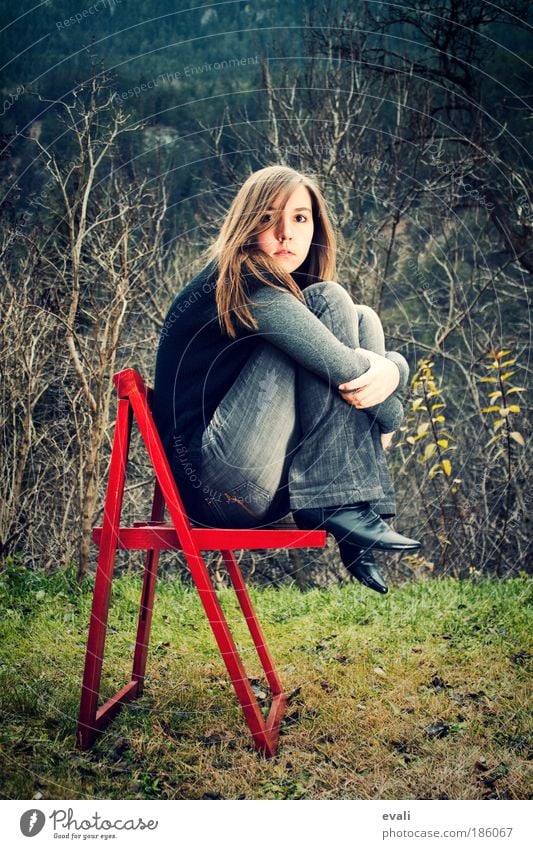 waiting Chair Human being Feminine Young woman Youth (Young adults) Woman Adults Hair and hairstyles Face 1 Think Looking Sit Wait Red Emotions Sadness Concern