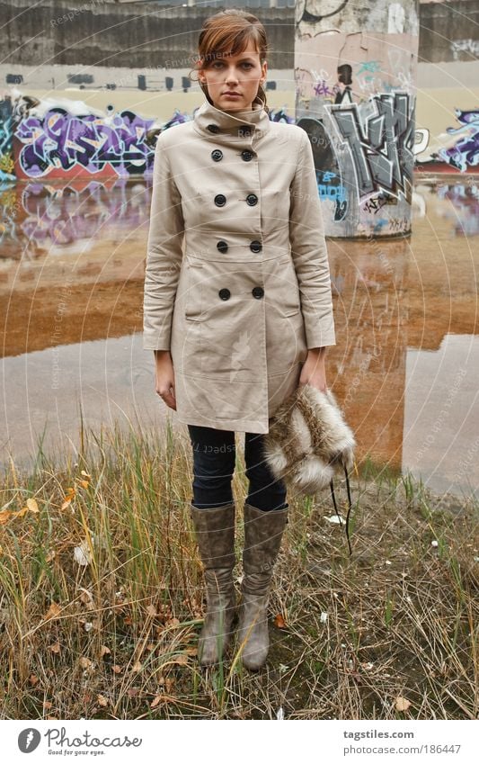 turned off Woman Graffiti Coat Water Surface of water Reflection Water reflection Colour photo Brunette Attractive Youth (Young adults) Painted Sprayed Trashy