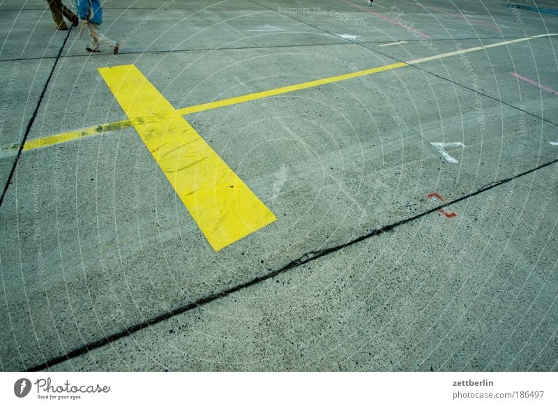 People at the edge of the text space Concrete Signs and labeling Line Stripe Joist Colour Structures and shapes Geometry open space Parking lot