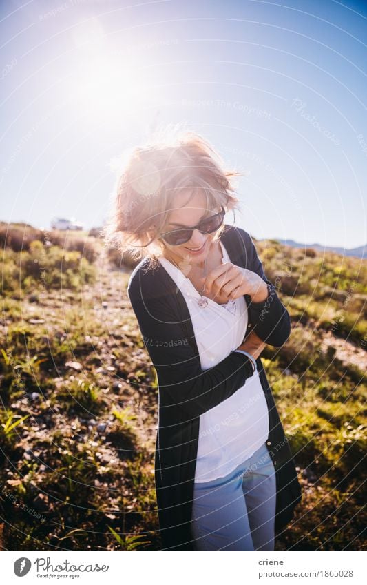 happy Mature women enjoying nature on holiday Lifestyle Joy Face Leisure and hobbies Vacation & Travel Summer Summer vacation Sun Sunbathing Human being