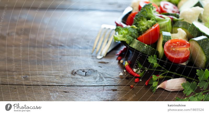 Fresh vegetables on a wooden table Vegetable Herbs and spices Eating Vegetarian diet Diet Fork Summer Table Leaf Dark Healthy Natural Yellow Green agriculture