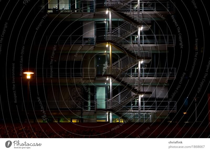 Stairs at the office building at night Bank building Industrial plant Building Architecture Window Gray Black Trade Colour photo Exterior shot Night