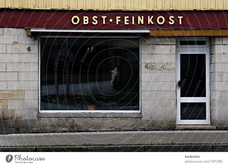 Gourmet Temple Food Fruit Delicatessen Delicacy Shop window Facade Blankenburg Town Pedestrian precinct Deserted Building Window Door Signs and labeling Hideous