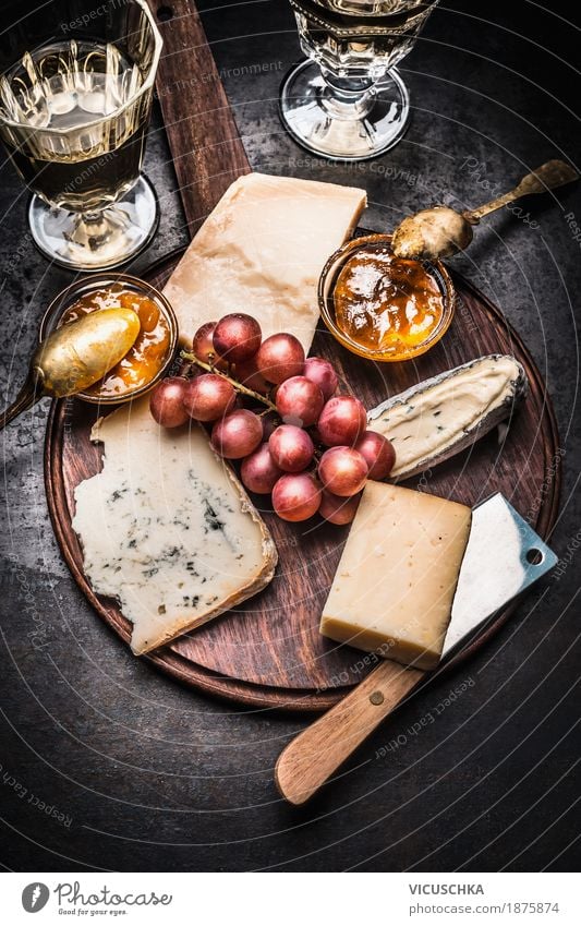 Fine cheese selection with wine, honey mustard sauce and grapes Food Cheese Fruit Nutrition Buffet Brunch Banquet Beverage Wine Crockery Glass Knives Style