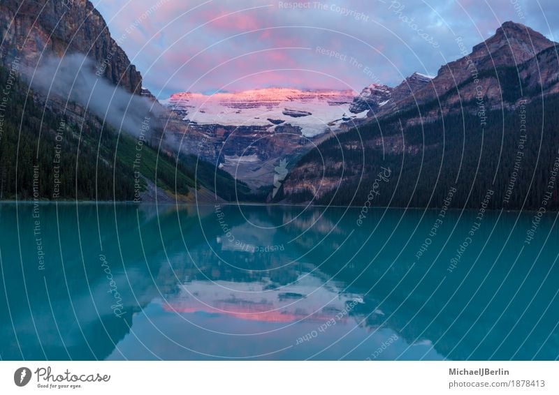 Sunrise over the glacier behind Lake Louise, Canada Nature Landscape Water Sunset Lakeside Glacier Natural Beautiful Banff National Park Glacier National park