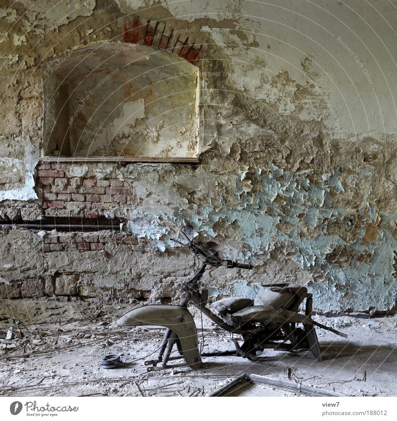 My grandmother rides a motorcycle in the chicken coop ... Cellar Wall (barrier) Wall (building) Facade Transport Vehicle Motorcycle Scooter Stone Concrete Sign