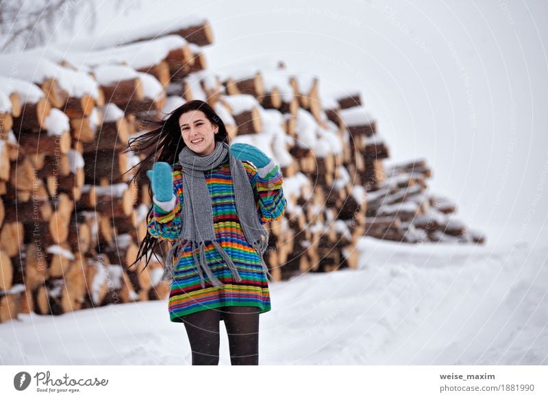 Beautiful young woman walking in winter outdoors Happy Winter Snow Young woman Youth (Young adults) Woman Adults 1 Human being 18 - 30 years Nature Clouds