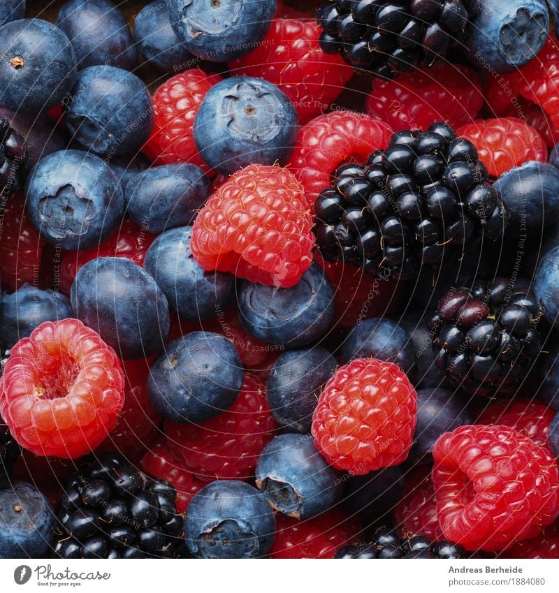 Fresh berries Fruit Vegetarian diet Healthy Eating Delicious Background picture mix red food dark Top assorted raspberries blue blueberries fresh fruits sweet