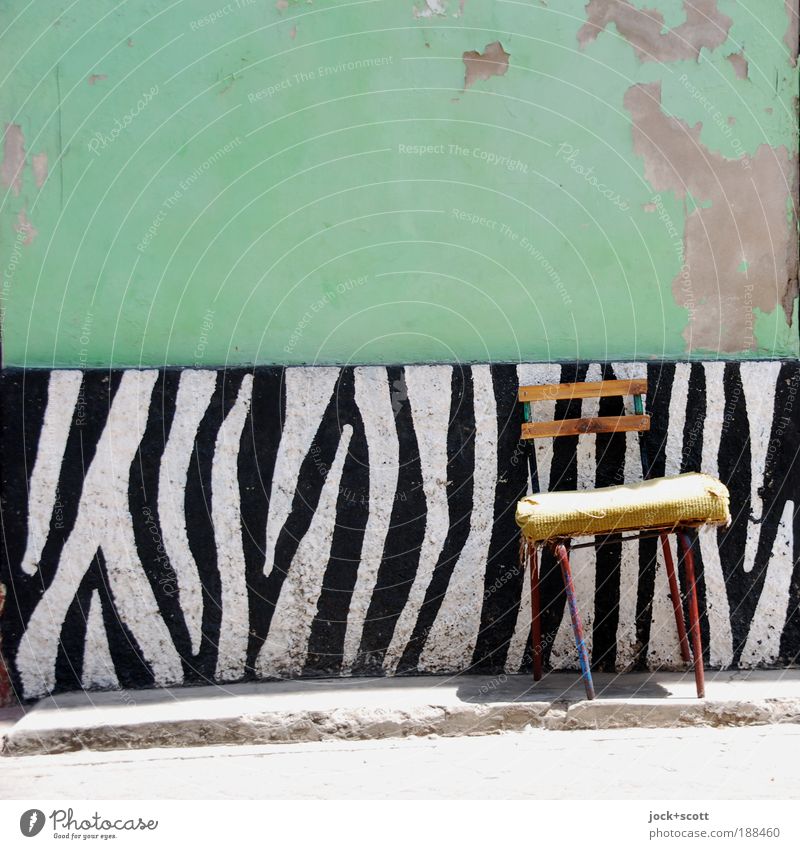 A crosswalk rarely comes alone Street art Old town Wall (building) Chair Exotic Uniqueness Original Serene Design Idyll Improvise Zebra crossing Ravages of time