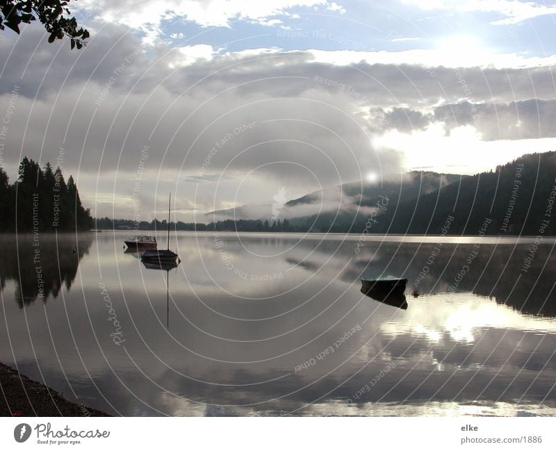 reflections Lake Watercraft Clouds Reflection Morning fog Fog Mountain