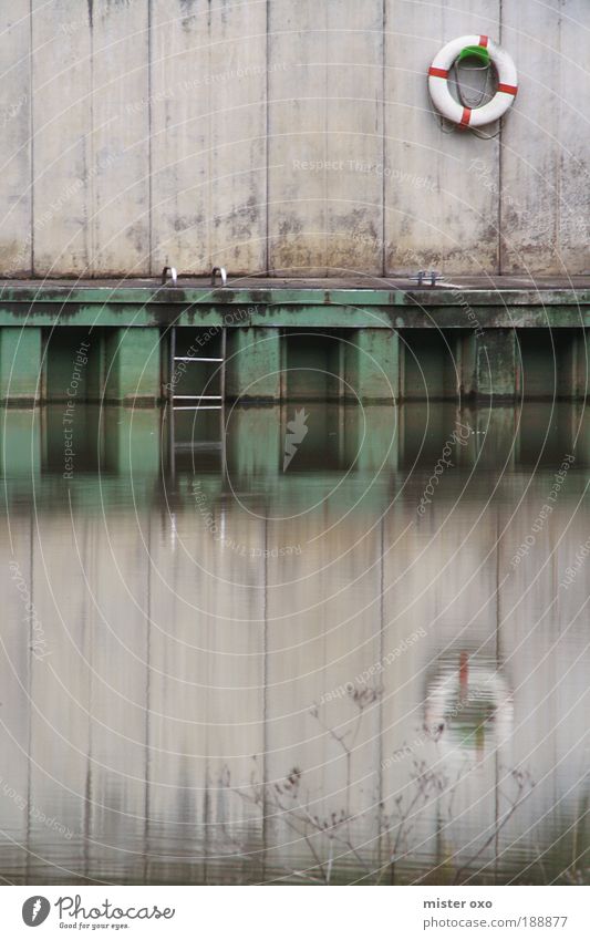 Lahn_Stilllife Nature River River bank Harbour Life belt Water Deserted Boating trip Ladder Exceptional Threat Dirty Gray Green Calm Loneliness Fear