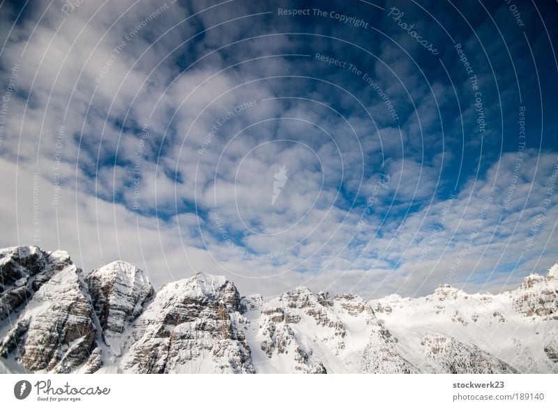 sawtooth modulation Winter Snow Winter vacation Mountain Nature Landscape Sky Clouds Beautiful weather Rock Alps Large Blue Black Silver White Vacation & Travel