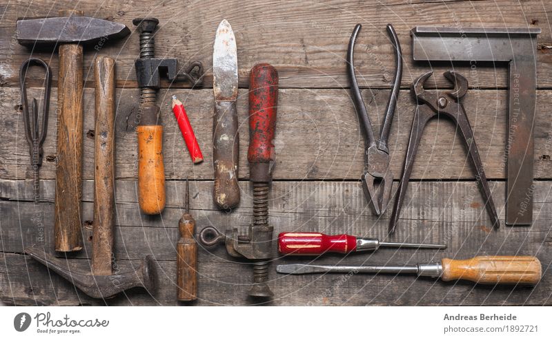 Old tool on a workbench Craft (trade) Construction site Tool Hammer Dirty Retro Creativity Performance metal wooden set wrench texture antique collection Grunge