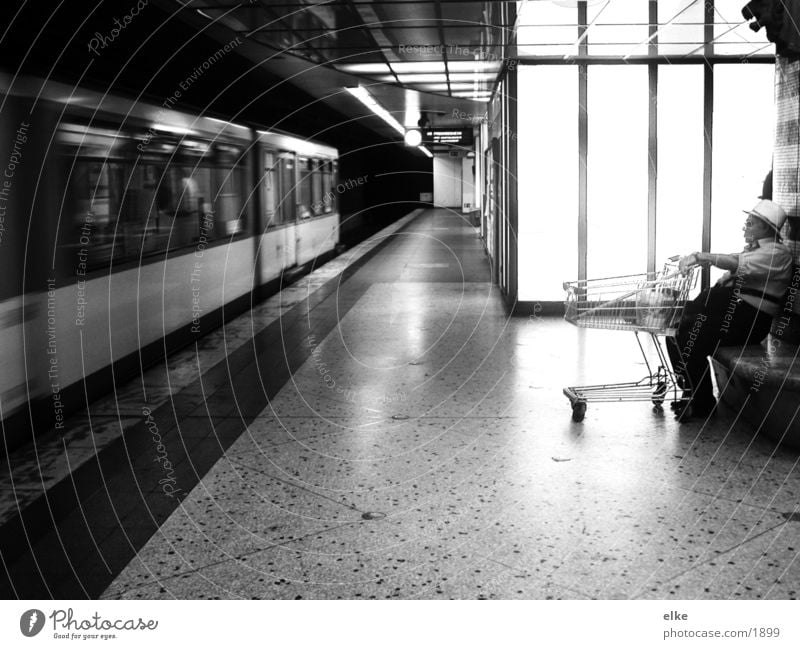 wait for the next Shopping Trolley Man Underground Transport Human being Black & white photo