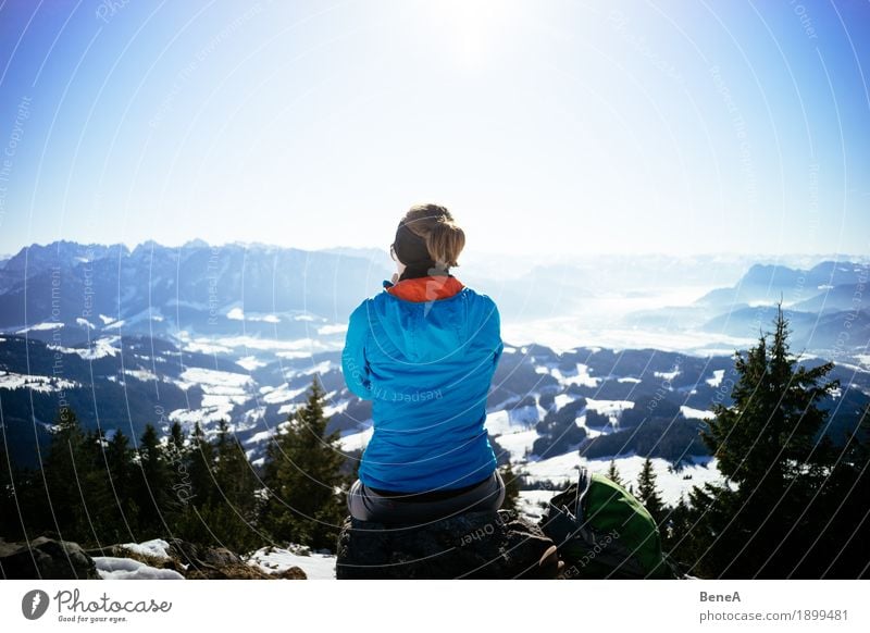 Woman sits on rocks at Trainsjoch and looks into the Inn valley Relaxation Vacation & Travel Adults Nature Fitness Uniqueness Experience Leisure and hobbies Joy