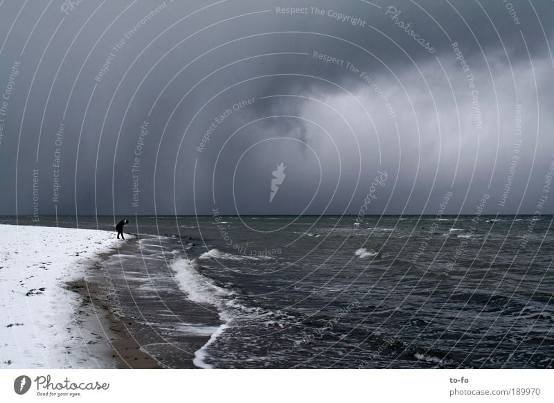 By the sea Beach Ocean Winter Snow Human being 1 Nature Landscape Air Water Clouds Storm clouds Climate Weather Wind Gale Rain Thunder and lightning Coast