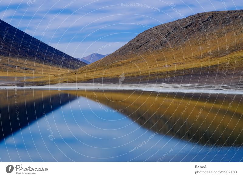 Reflection of mountains in a lagoon in the Atacama Desert Adventure Far-off places Safari Expedition Mountain Environment Nature Landscape Plant Water Sky