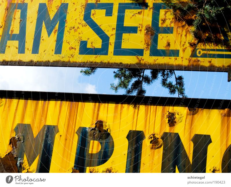 At the lake Dongo Italy Europe Fishing village Port City Signs and labeling Metal Signage Warning sign Road sign Shield Old Dirty Trashy Blue Yellow 2009 Como