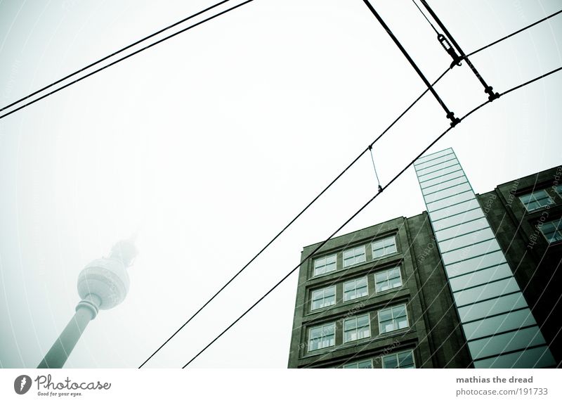 tower Sky Clouds Winter Bad weather Fog Town Downtown Skyline Train station Tower Manmade structures Building Architecture Facade Tourist Attraction Landmark