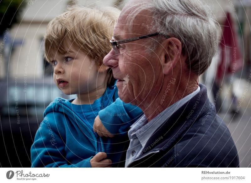 Grandpa has his grandson on his arm Human being Masculine Child Toddler Boy (child) Man Adults Male senior Grandfather Family & Relations Infancy Face 2