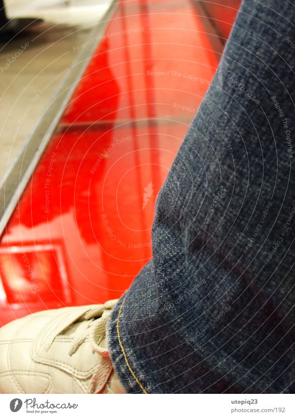 Svergie shopping spree Trouser leg Footwear Leather Red Reflection Pants Stockholm Jeans Human being Modern Macro (Extreme close-up) Close-up Sit Statue Glass