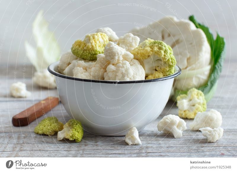 Fresh raw cauliflower in a bowl Vegetable Nutrition Vegetarian diet Diet Bowl Wood Retro Green Cauliflower cabbage Cooking food health healthy Ingredients