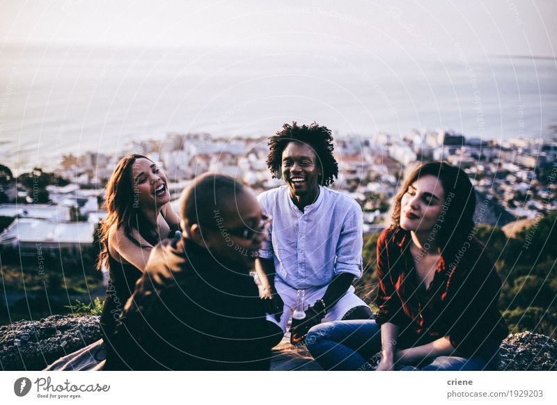 mixed race group of friends hanging out together Lifestyle Joy Freedom Entertainment Going out Drinking Feasts & Celebrations To talk Human being Young woman