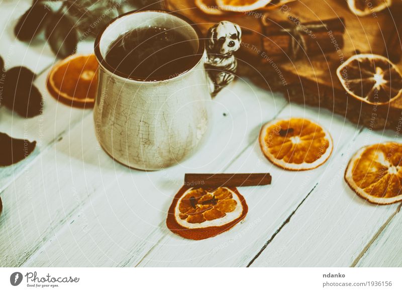 cup of hot tea on a white wooden surface with dried fruits Fruit Herbs and spices Breakfast Tea Cup Mug Table Wood Fresh Hot Delicious Retro Brown Orange White