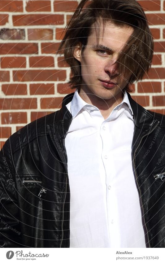 looked - young man in leather jacket and shirt in front of a brick wall Style Joy Stone wall Young man Youth (Young adults) Hair and hairstyles Face