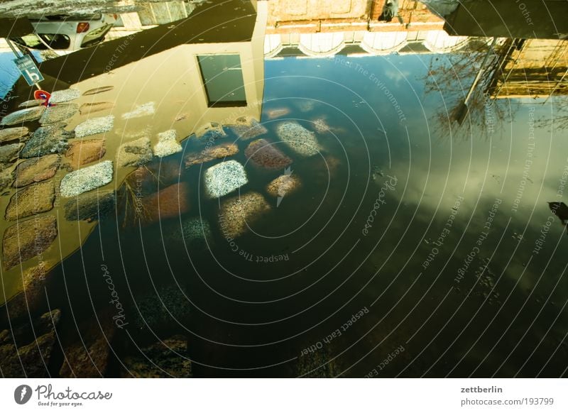 fond Puddle Water Surface of water Reflection Paving stone Cobblestones House (Residential Structure) Building