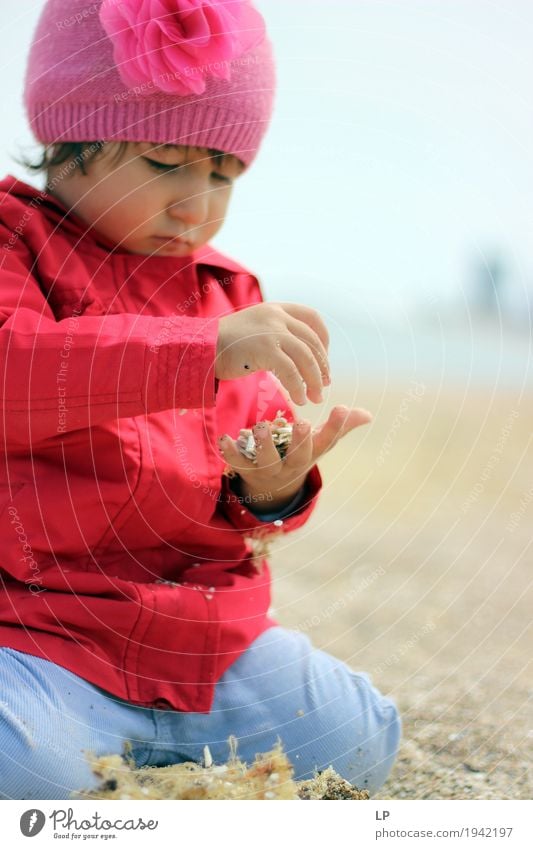 child playing with sand Lifestyle Leisure and hobbies Playing Children's game Parenting Education Kindergarten School Study Schoolyard Classroom Schoolchild