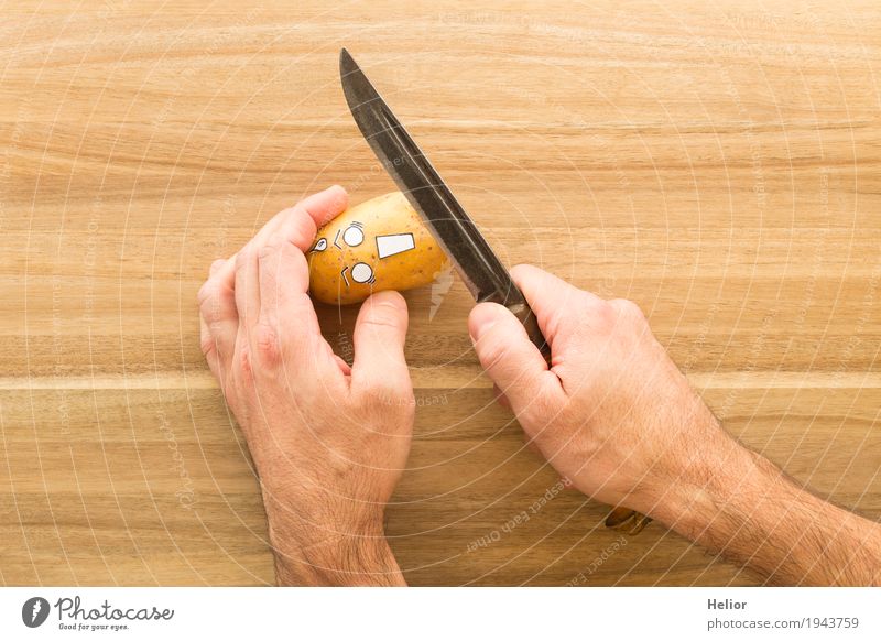 Potato in panic fear of a sharp armor knife Vegetable Potatoes Nutrition Hand Knives Chopping board Wood Steel Threat Creepy Delicious Funny Brown Black White