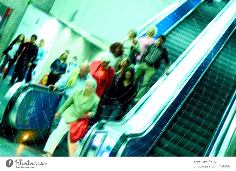 escalator Escalator Underground London Underground Commuter trains Green Speed Stress Transport Stairs Blue Human being Photos of everyday life