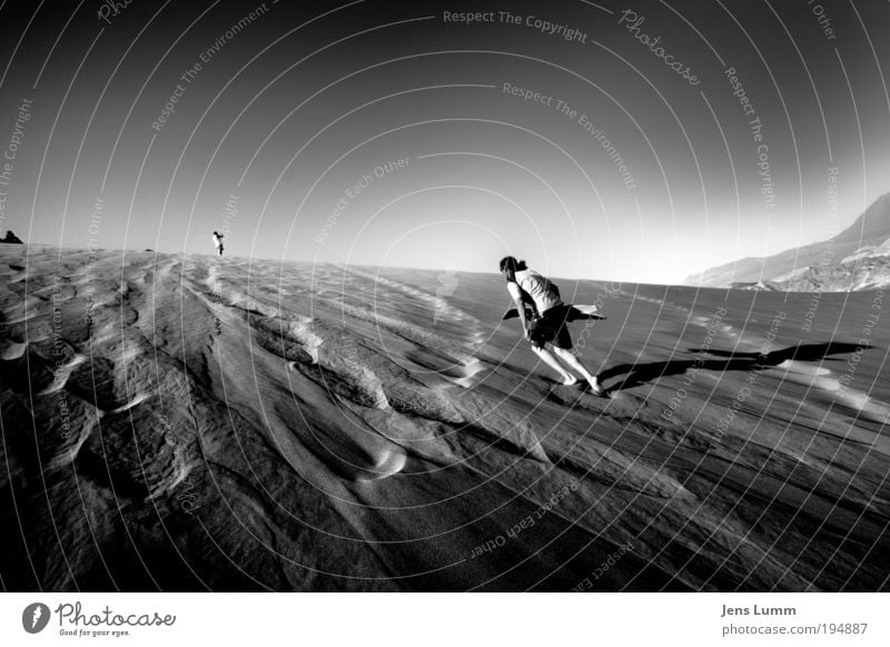 Fearless Human being Masculine 3 Sand Desert Swimming trunks Going Gloomy Dry Movement Bizarre Salar de Atacama Surfer Surfboard Black & white photo