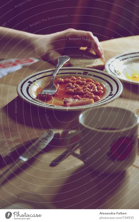 baked beans Dinner table Table Plate Cup Coffee Coffee cup Beans Knives Fork Bread Breakfast table Lunch Lunch hour Wooden board Eating Meal Food Colour photo